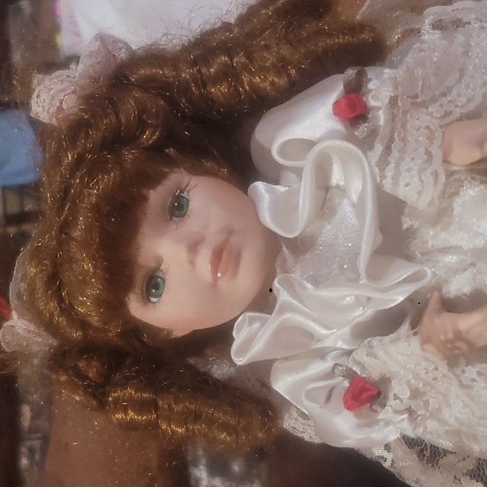 Vintage Melissa Porcelain musical whind up moving doll